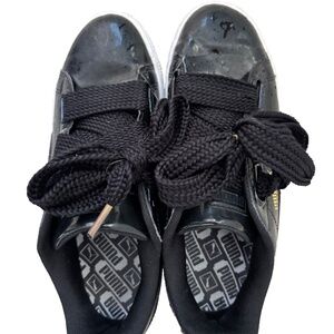Black patent Size 6.5  Puma Fashion lightly worn sneaker.